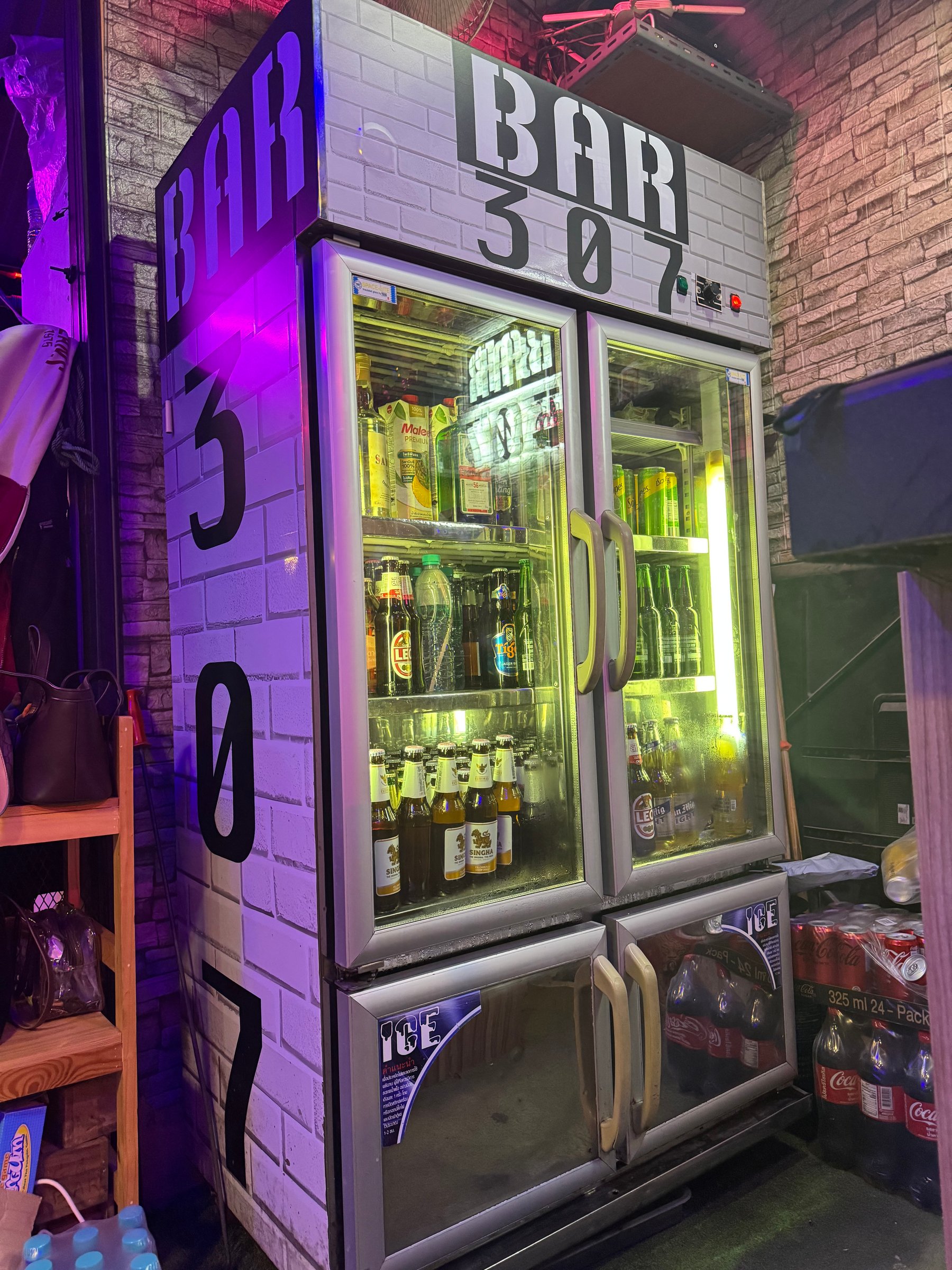 Fridges stocked with ice-cold Chang, Leo and Singha at Bar 307