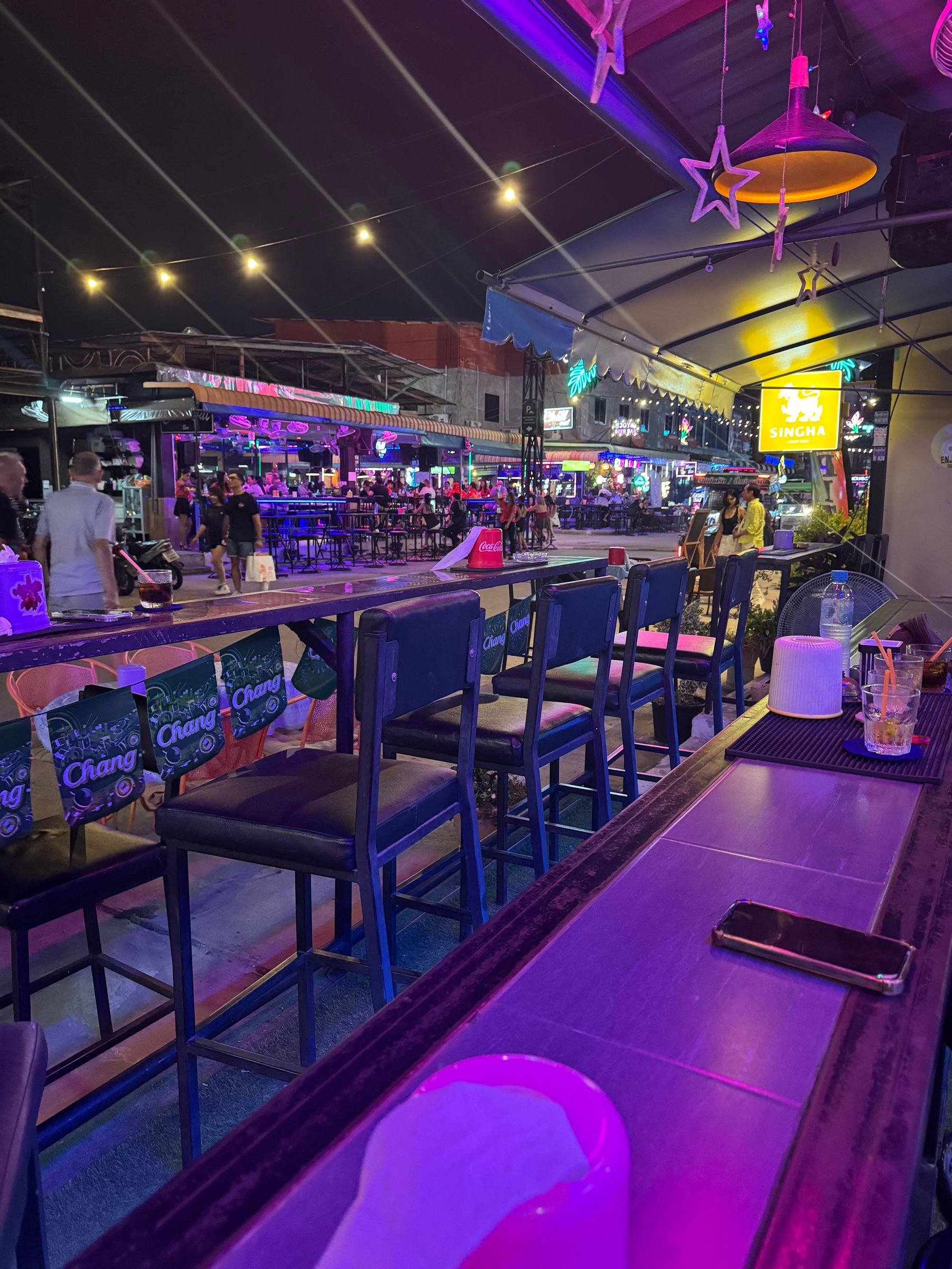Bar 307 open-air terrace overlooking Tree Town at night